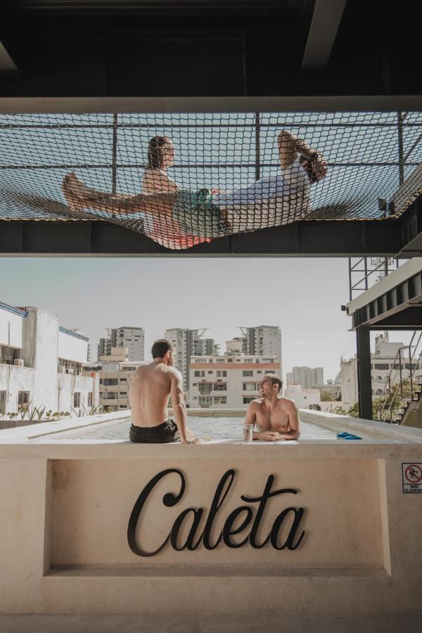 Caleta Hostel Rooftop & Pool Канкун Экстерьер фото